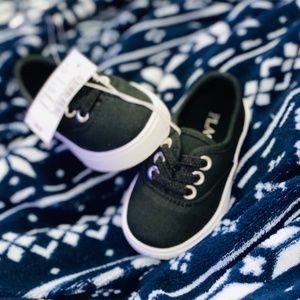 Slip on black sneakers